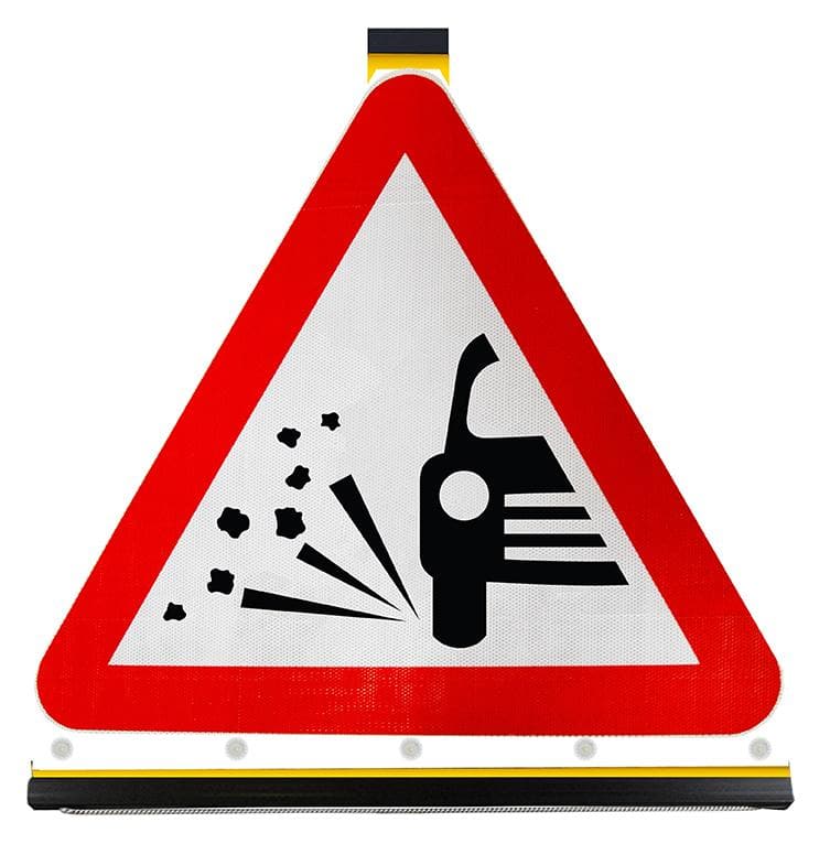 Loose Chippings on Road Ahead — Protect Signs